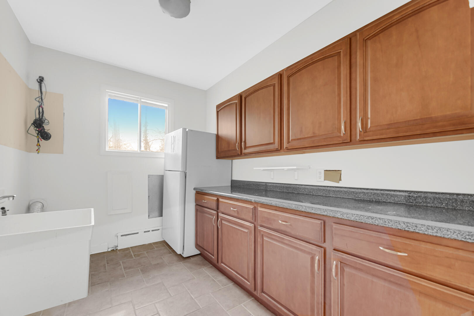 3721 West 133rd Avenue Crown Point, IN 46307 - Photo 12 of 30 a kitchen with sink cabinets and utility