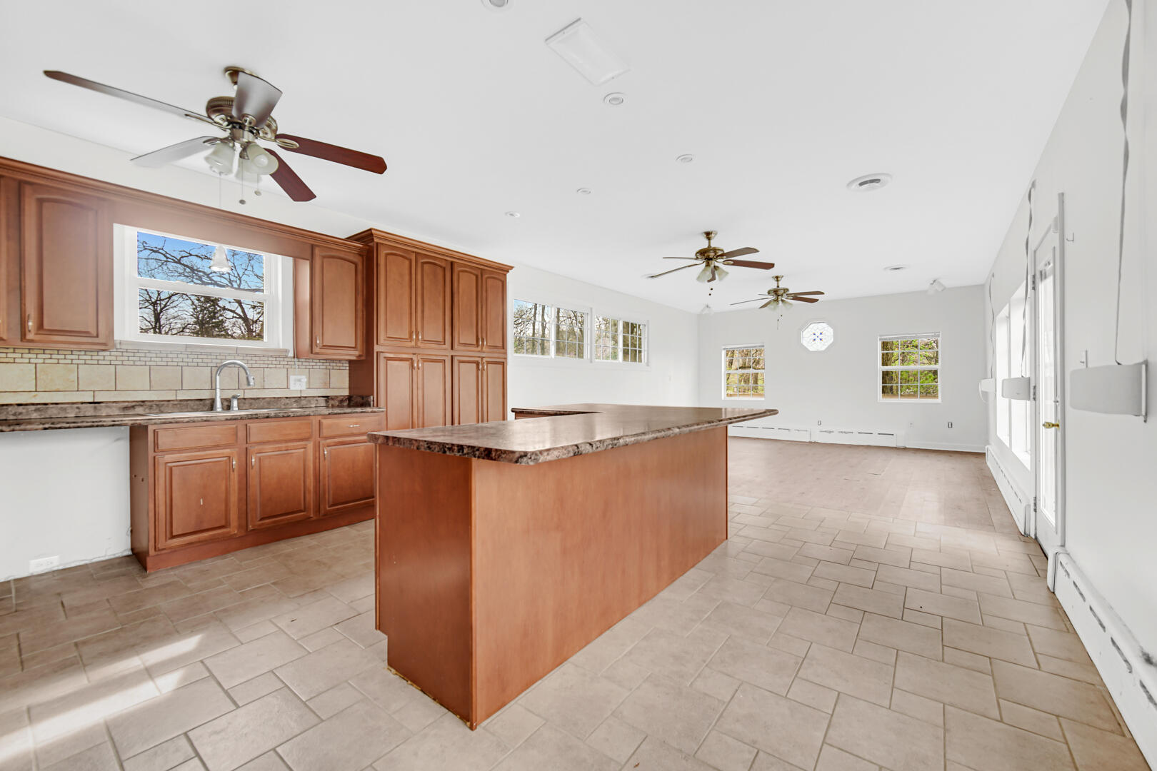 3721 West 133rd Avenue Crown Point, IN 46307 - Photo 13 of 30 a view of a kitchen with a sink and dishwasher