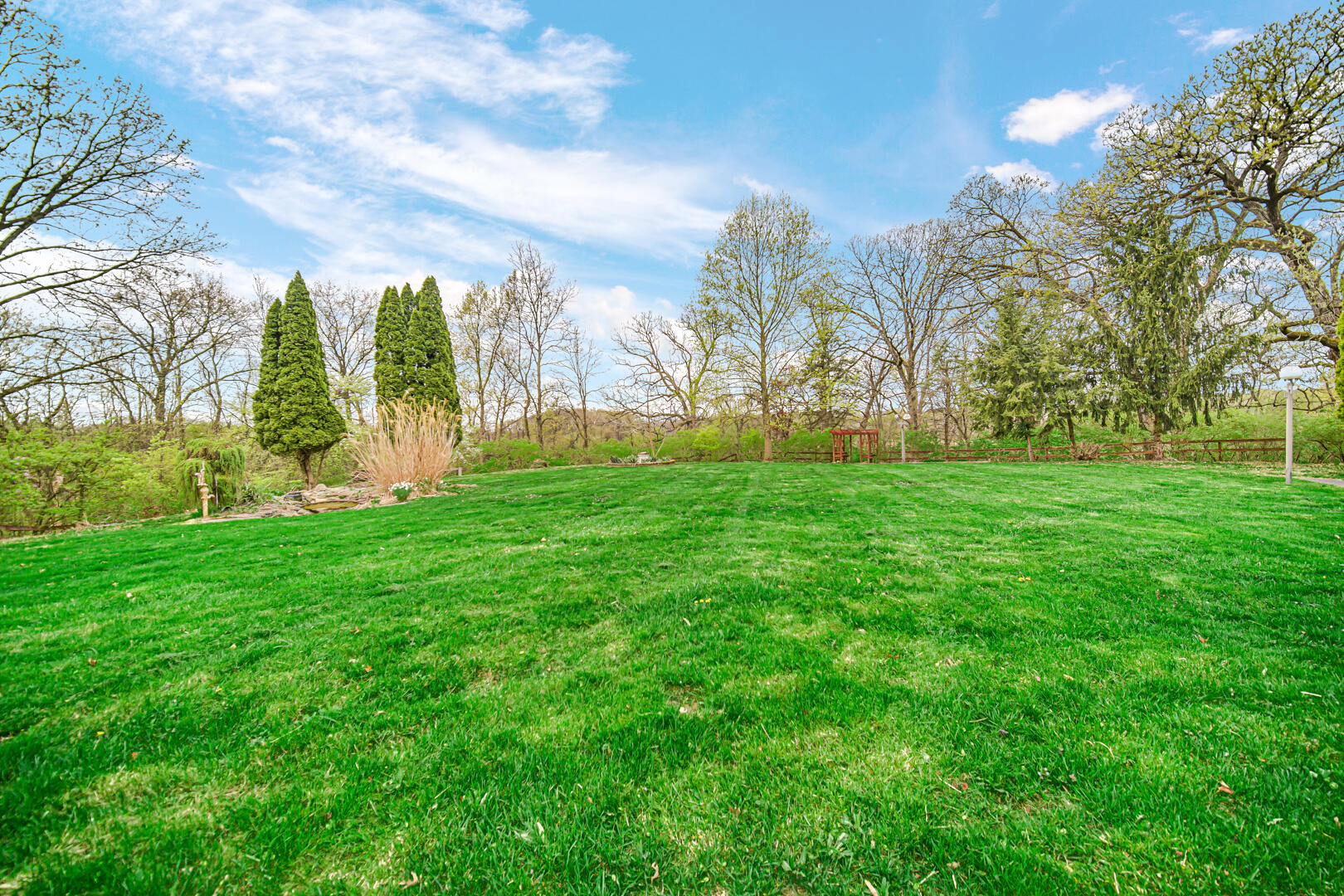 3721 West 133rd Avenue Crown Point, IN 46307 - Photo 28 of 30 a view of a park with large trees