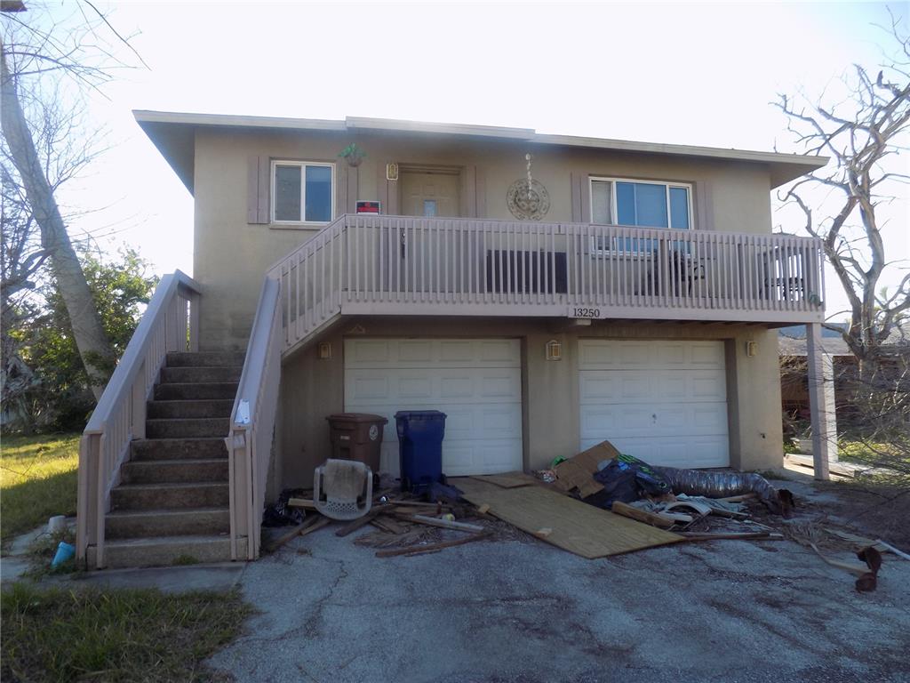 13250 4th Street East Madeira Beach, FL 33708 - Photo 1 of 1 Rent out both units or live in one and rent the other. Each unit has it's own garage.