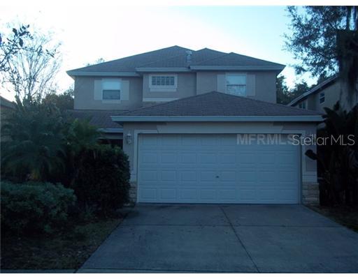 5819 Tanagerside Road Lithia, FL 33547 - Photo 1 of 1 a view of house with outdoor space
