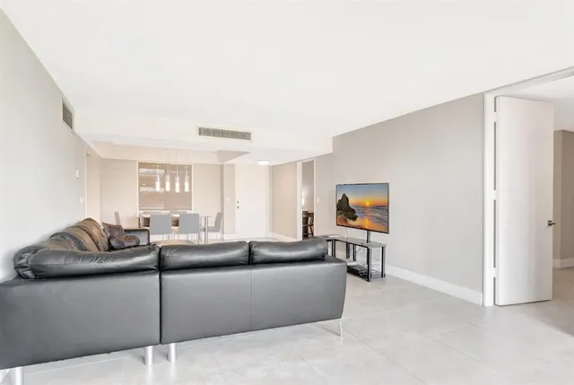 a living room with furniture and a couch