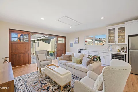 a living room with furniture and a table