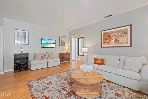 a living room with furniture and a couch