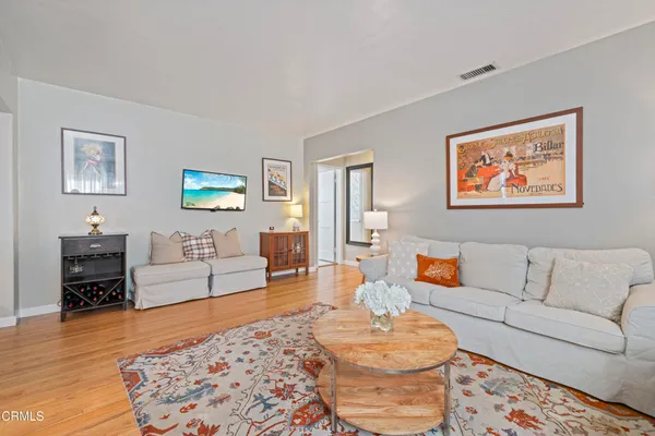 a living room with furniture and a couch