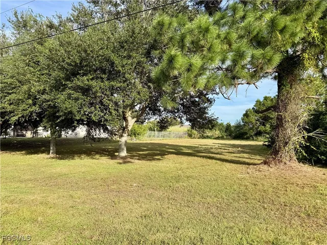 a view of swimming pool with an outdoor space and seating area