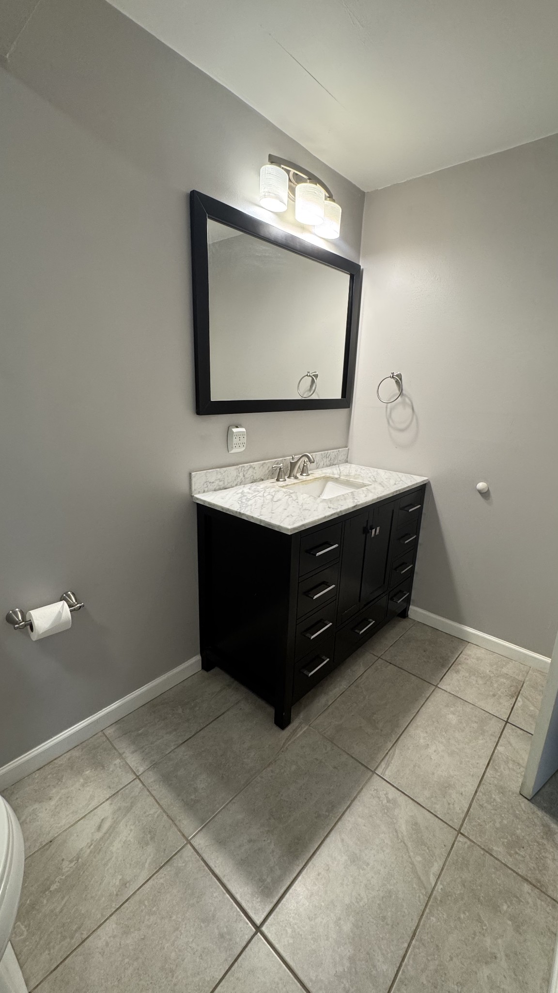 420 Walton Lane, Unit J48 Madison, TN 37115 - Photo 12 of 15 a living room with a furniture and a flat screen tv