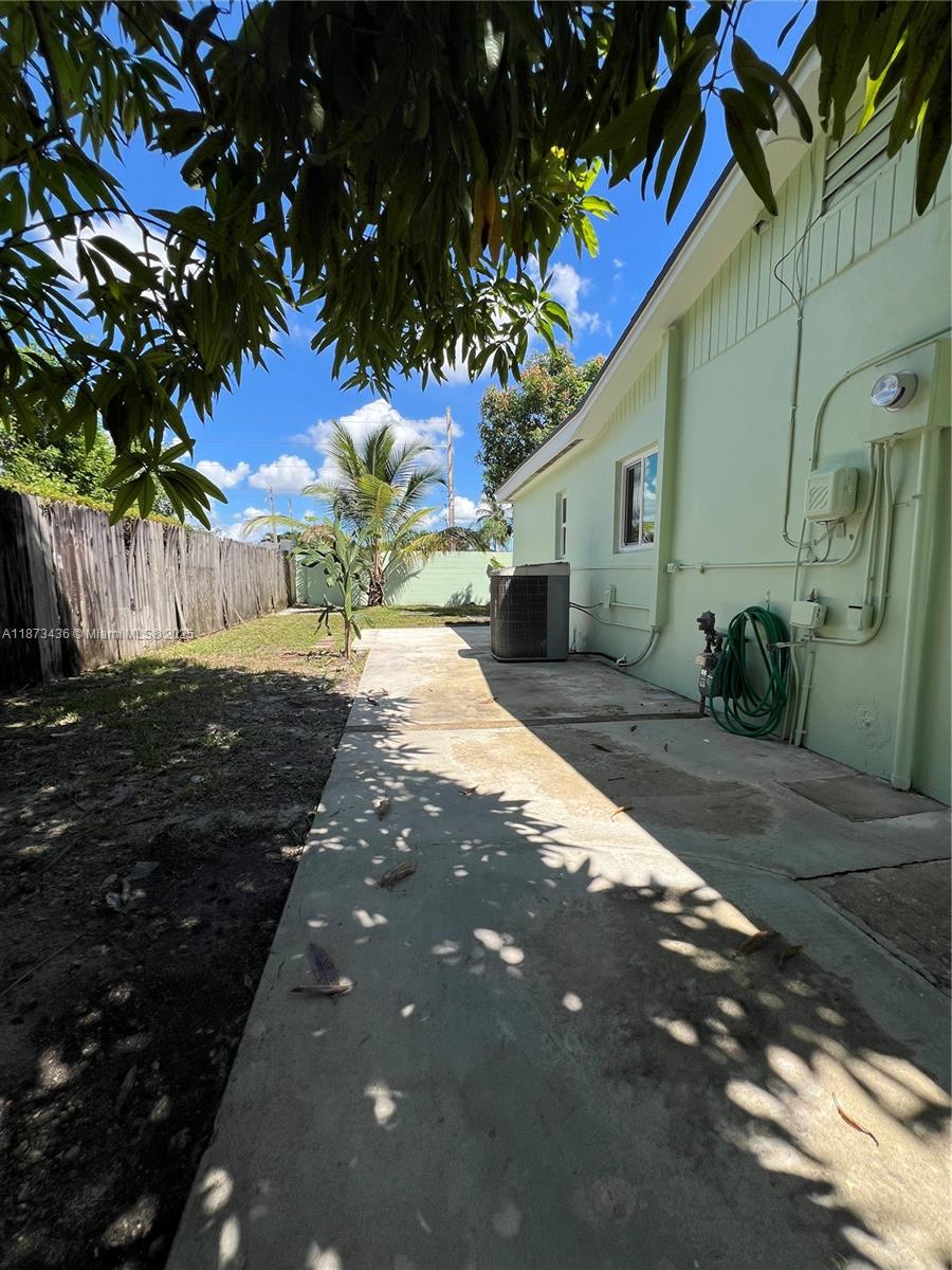 10315 Southwest 152nd Terrace Miami, FL 33157 - Photo 10 of 12 a view of a backyard