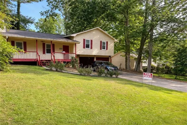 a front view of a house with swimming pool