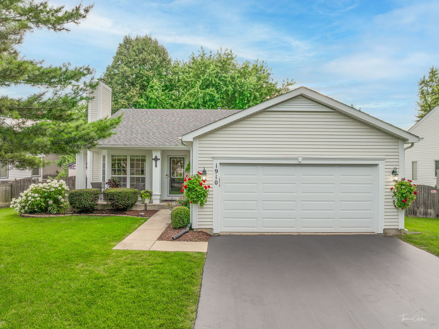 1910 Baldwin Way Bolingbrook, IL 60490 - Photo 1 of 38 a front view of house with yard and green space