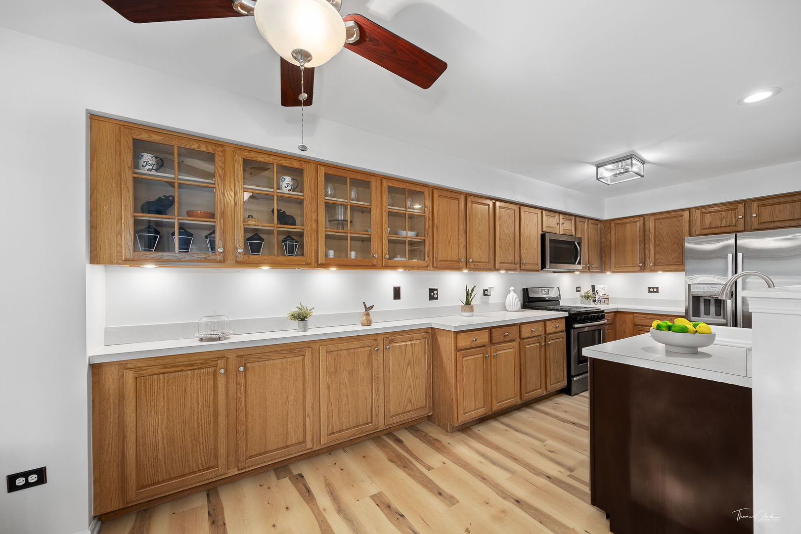 1910 Baldwin Way Bolingbrook, IL 60490 - Photo 14 of 38 a kitchen with lots of counter space and wooden floor