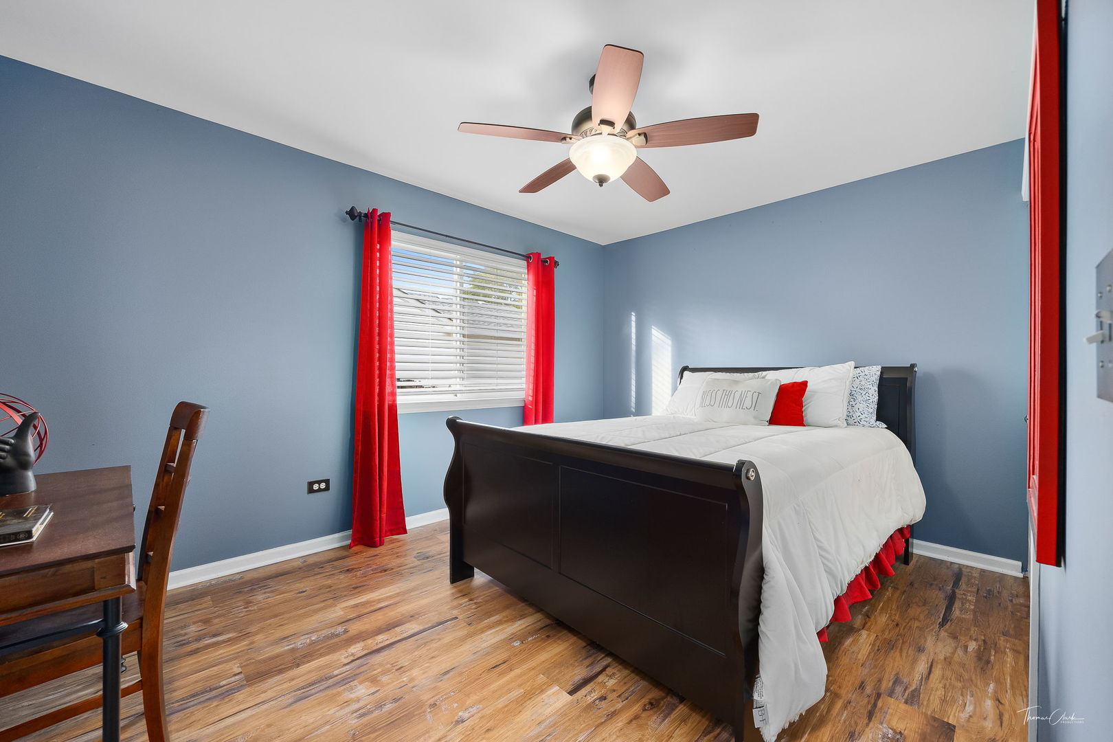 1910 Baldwin Way Bolingbrook, IL 60490 - Photo 22 of 38 a bedroom with a bed and a chandelier
