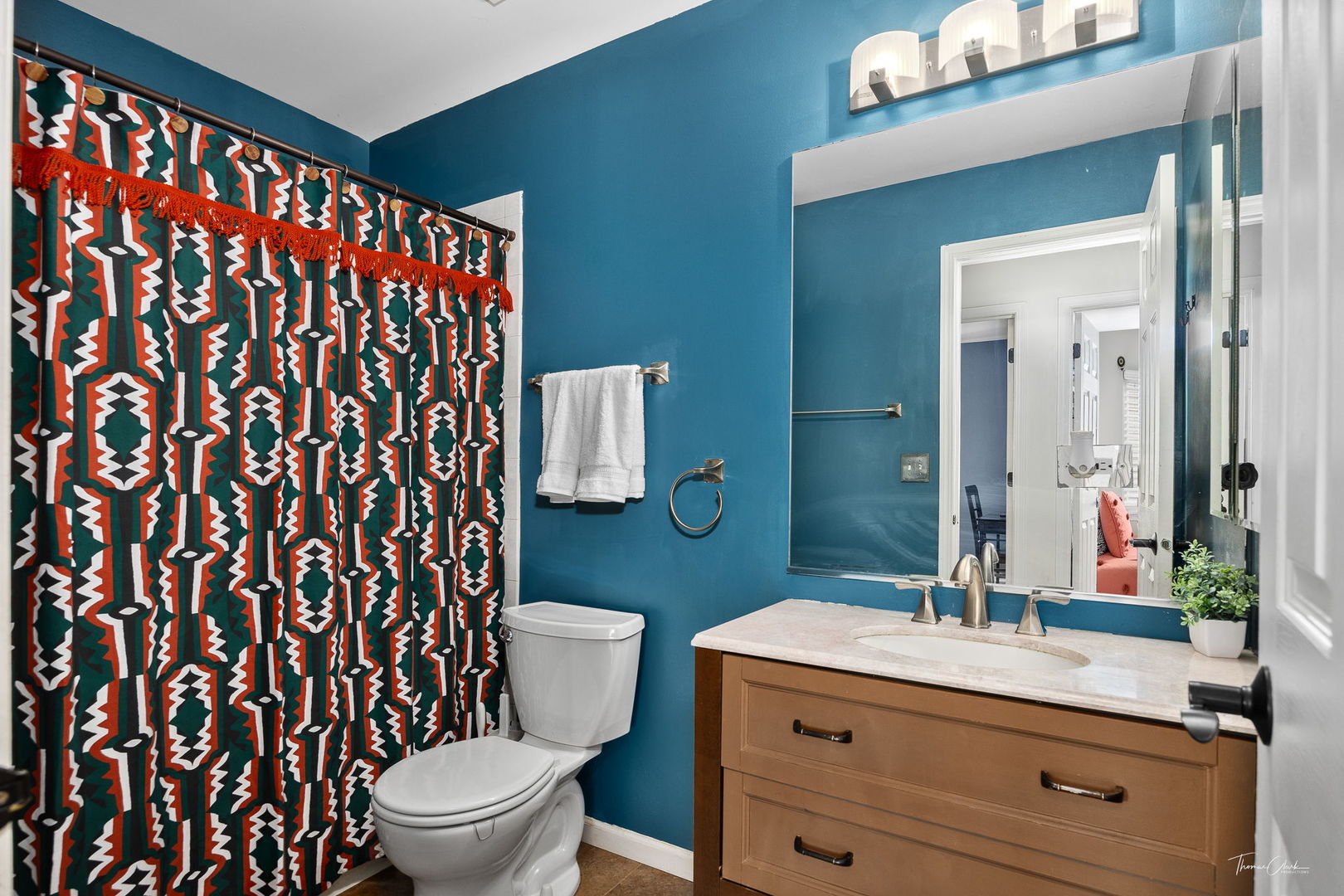 1910 Baldwin Way Bolingbrook, IL 60490 - Photo 23 of 38 a bathroom with a granite countertop sink toilet a mirror and shower curtain