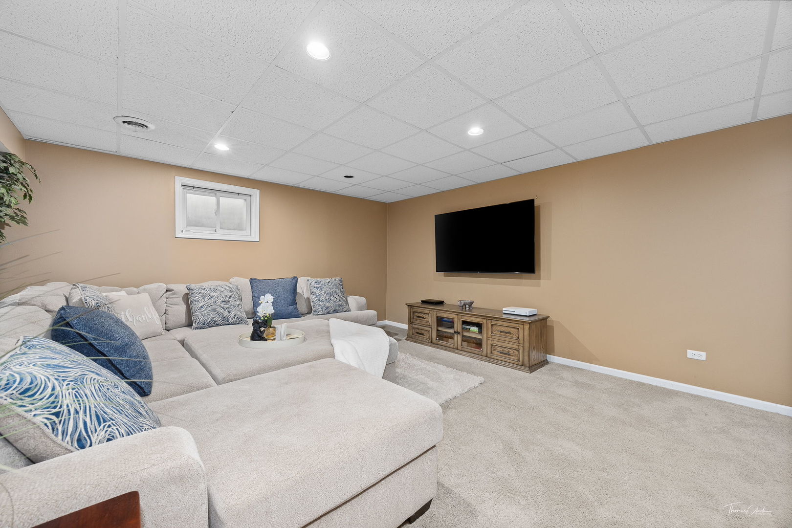 1910 Baldwin Way Bolingbrook, IL 60490 - Photo 25 of 38 a living room with furniture and a flat screen tv