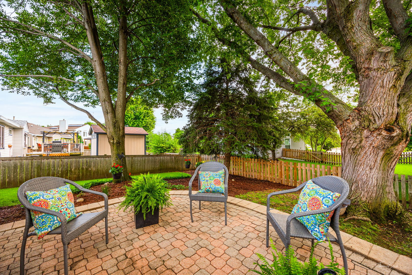 1910 Baldwin Way Bolingbrook, IL 60490 - Photo 30 of 38 a backyard of a house with table and chairs