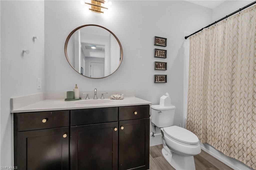 3634 Canopy Circle Naples, FL 34120 - Photo 12 of 20 Full Bath with Vanity and Tub/Shower