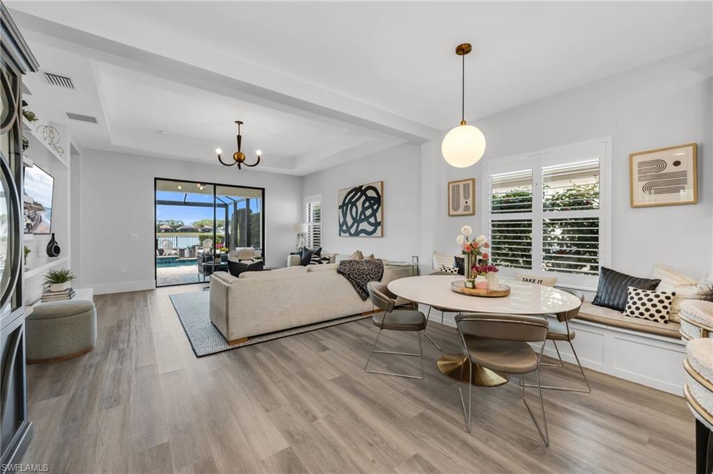 3634 Canopy Circle Naples, FL 34120 - Photo 2 of 20 Open Concept Dining Area and Living Room