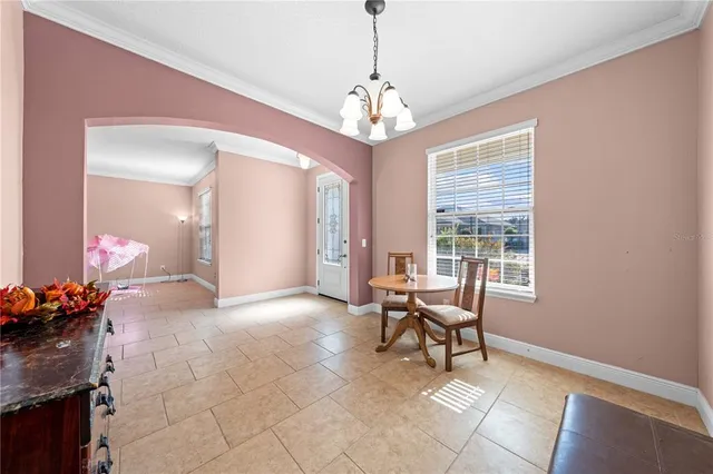 a view of a livingroom with furniture and windows