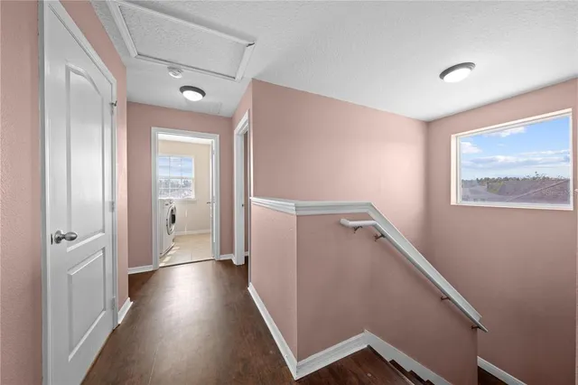 a view of a bedroom from a hallway