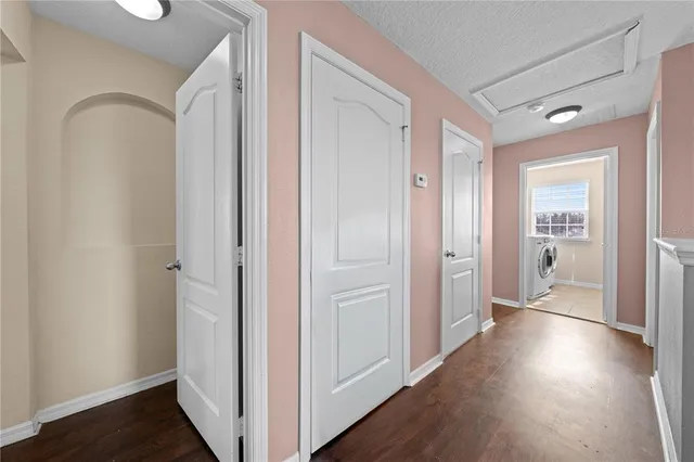 a view of a bedroom from a hallway