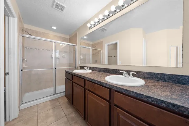 a aerial view of a house with swimming pool