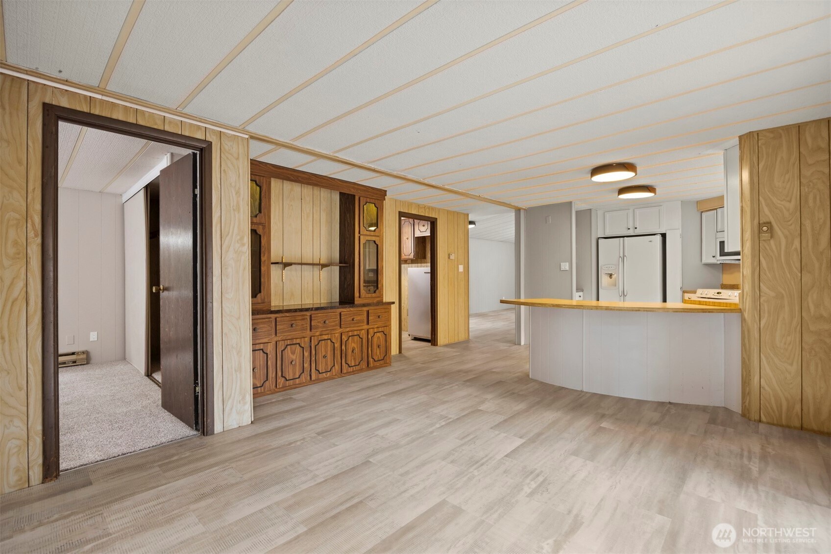 8532 Juniper Place Maple Falls, WA 98266 - Photo 14 of 37 wooden floor in an empty room with a window