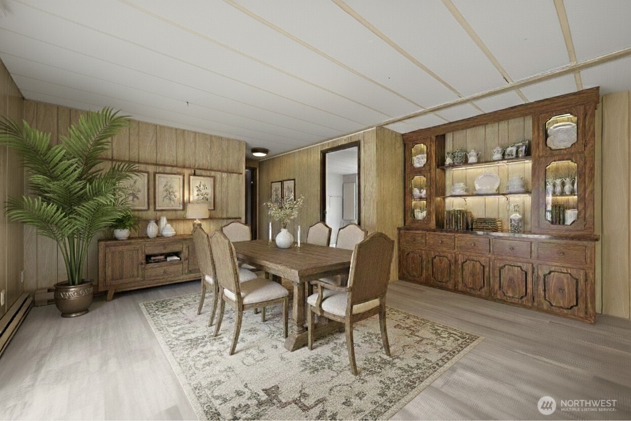 8532 Juniper Place Maple Falls, WA 98266 - Photo 19 of 37 a view of a dining room with furniture window and wooden floor