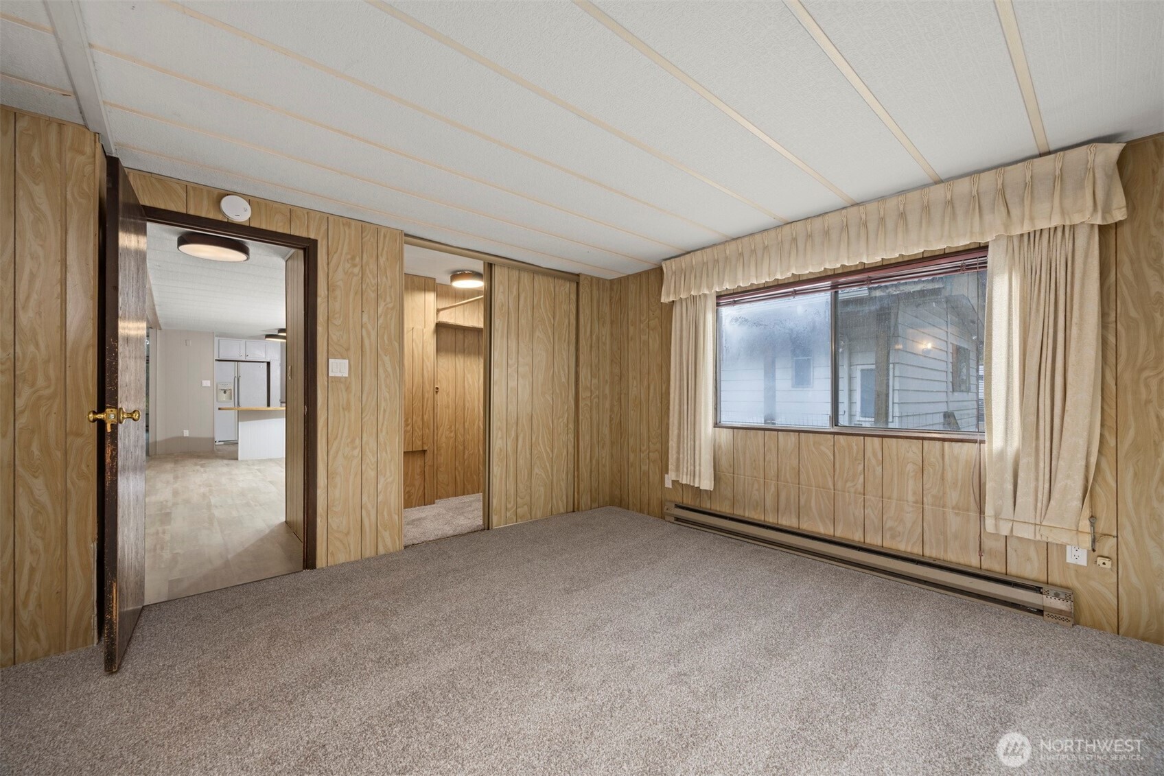 8532 Juniper Place Maple Falls, WA 98266 - Photo 20 of 37 an empty room with mirror in front door
