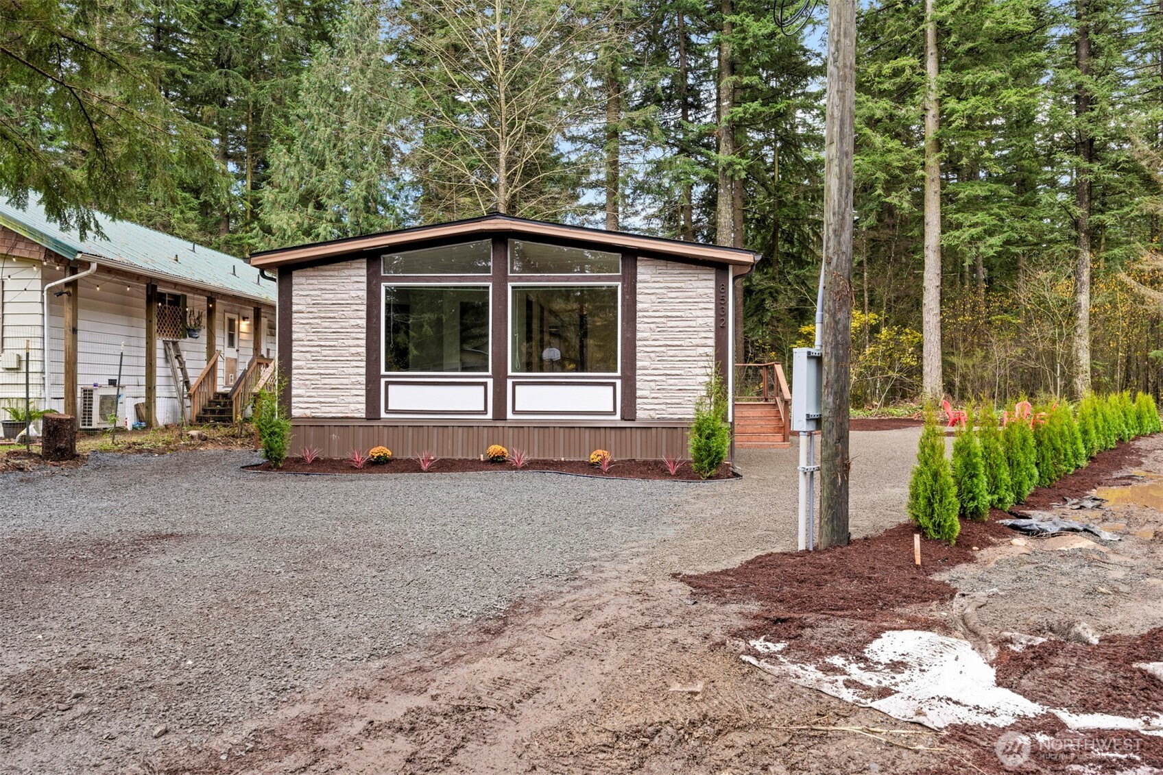 8532 Juniper Place Maple Falls, WA 98266 - Photo 36 of 37 a front view of a house with a yard and garage
