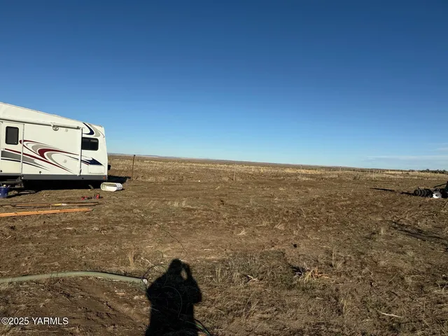 a view of parking area with ocean