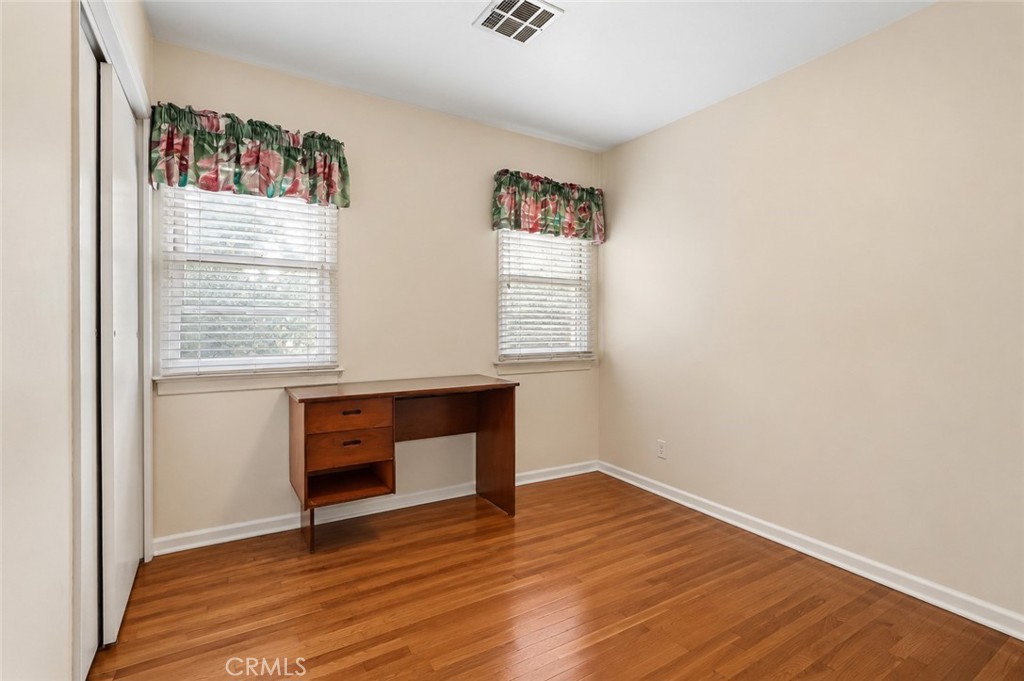 2209 Queensberry Road Pasadena, CA 91104 - Photo 27 of 44 a room with window and a wooden floor