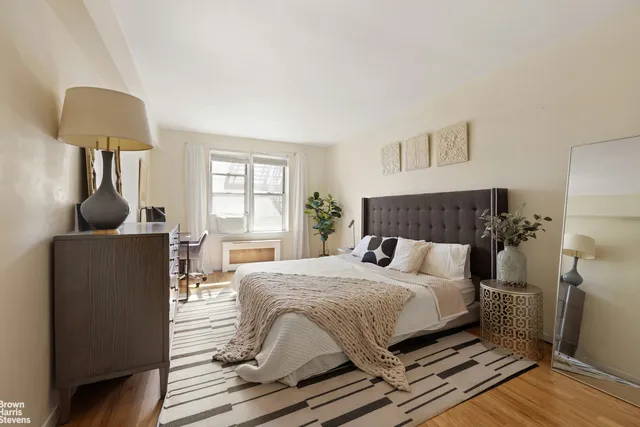 a kitchen with a refrigerator sink and white cabinets