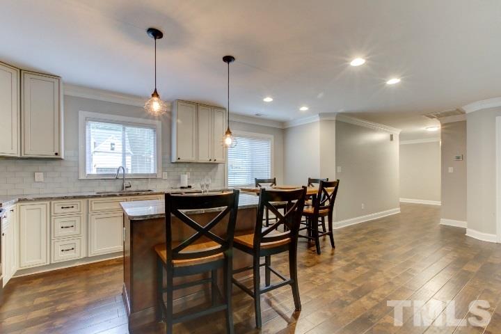 521 Ranch Farm Road Raleigh, NC 27603 - Photo 15 of 30 a view of a kitchen and dining room
