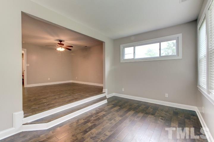 521 Ranch Farm Road Raleigh, NC 27603 - Photo 20 of 30 a view of room with window and hardwood floor