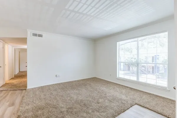 an empty room with a window