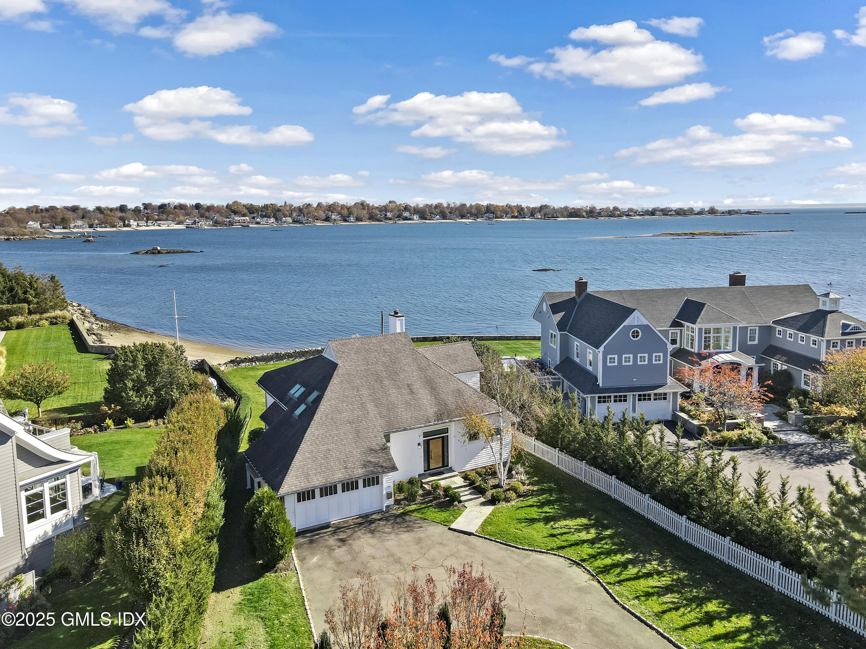 Undisclosed Address Stamford, CT 06902 - Photo 1 of 1 an aerial view of a house with lake view