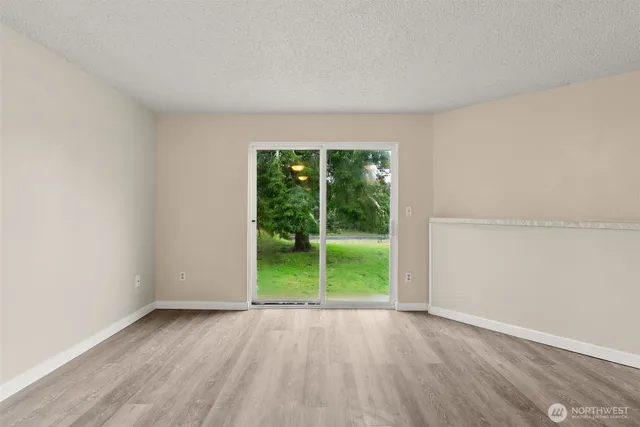 a view of a bathroom from a hallway