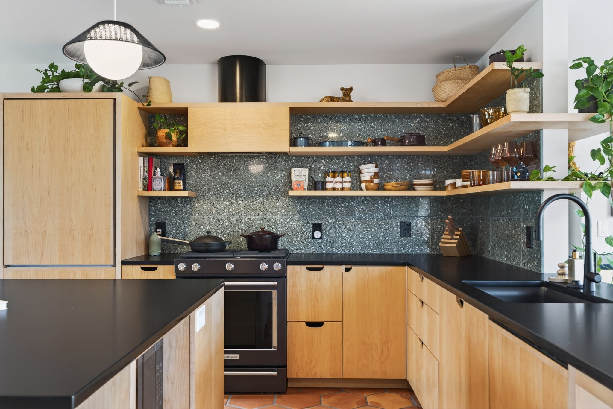 1712 Giles Street Austin, TX 78722 - Photo 1 of 1 view of kitchen with wooden floor and cabinets
