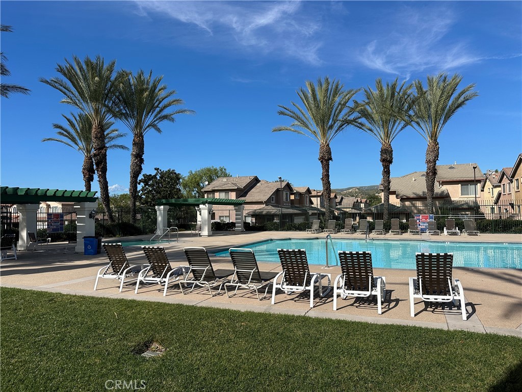 1760 Millpark Lane Simi Valley, CA 93065 - Photo 20 of 21 a view of a swimming pool and lounge chair