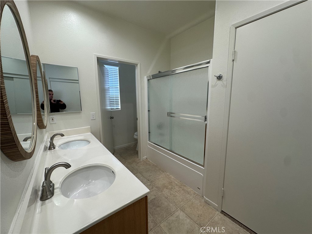 1760 Millpark Lane Simi Valley, CA 93065 - Photo 10 of 21 a bathroom with a sink toilet and shower
