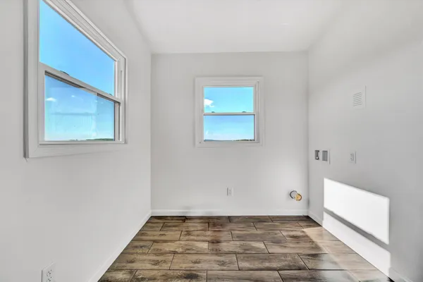 a view of an empty room and window