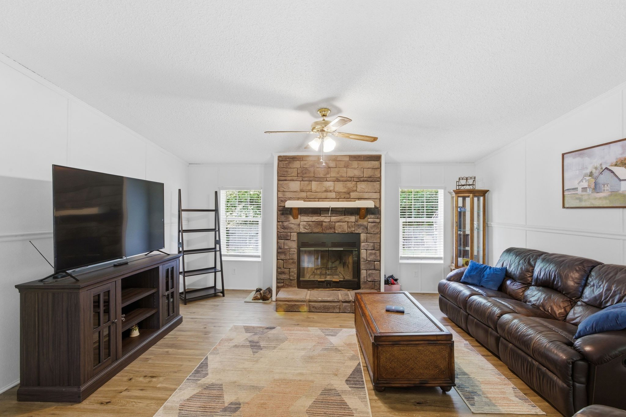 230 East Piney Road Dickson, TN 37055 - Photo 11 of 36 a living room with furniture and a flat screen tv