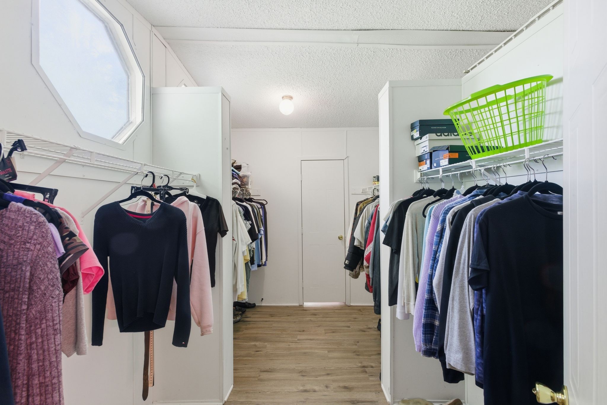 230 East Piney Road Dickson, TN 37055 - Photo 17 of 36 a view of walk in closet with clothes and shoes