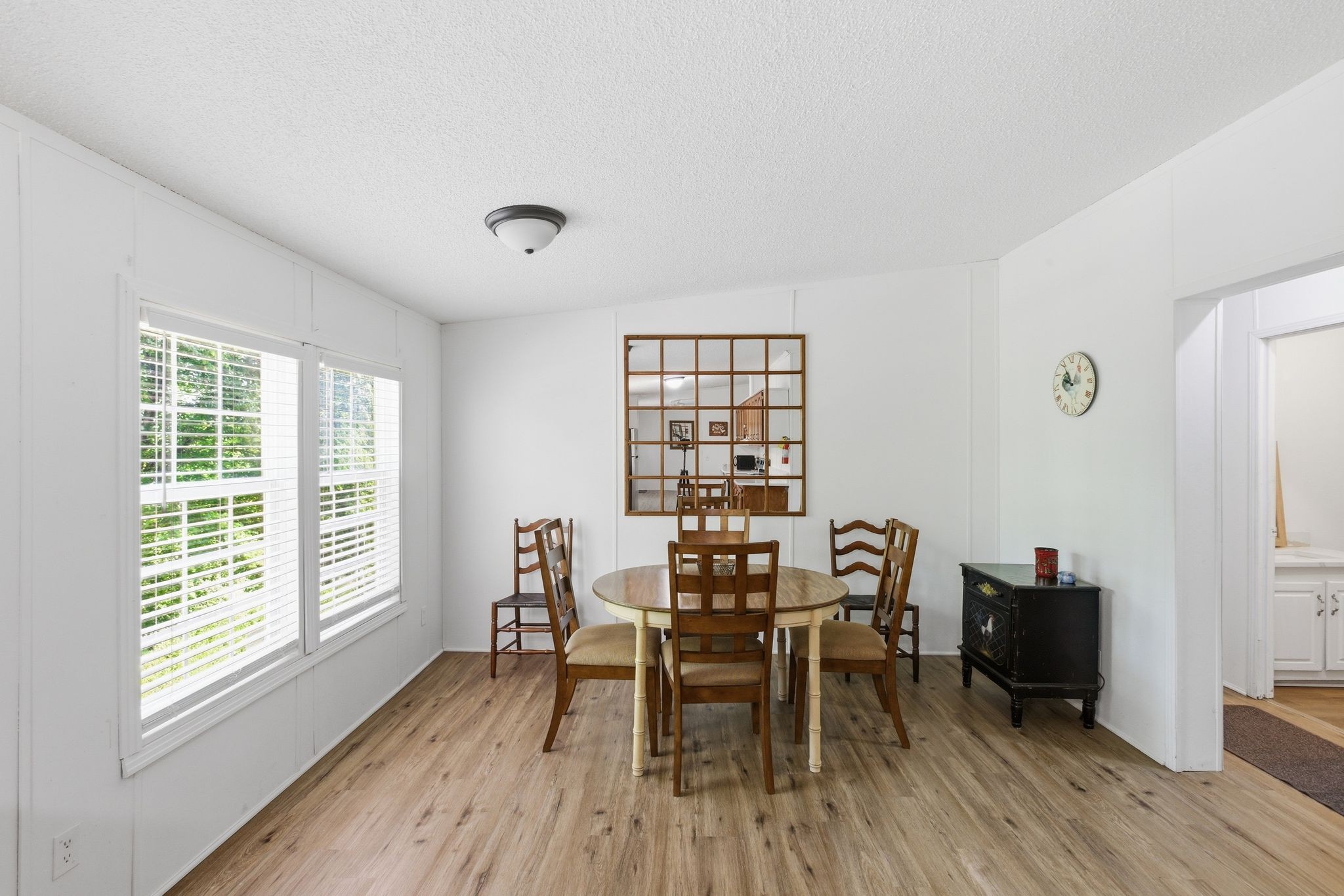 230 East Piney Road Dickson, TN 37055 - Photo 20 of 36 a dining room with furniture and wooden floor