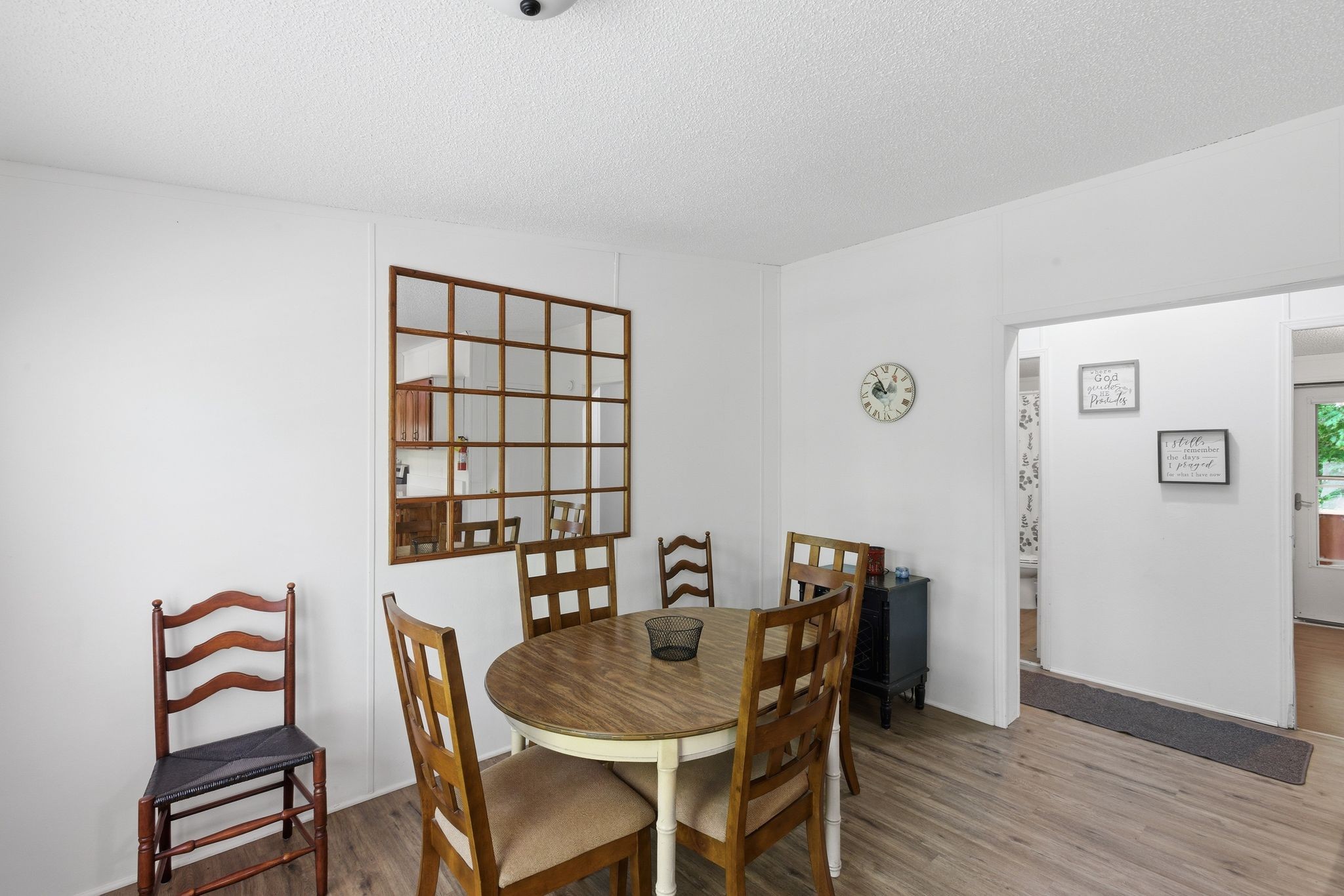 230 East Piney Road Dickson, TN 37055 - Photo 21 of 36 a view of a dining room with furniture and wooden floor
