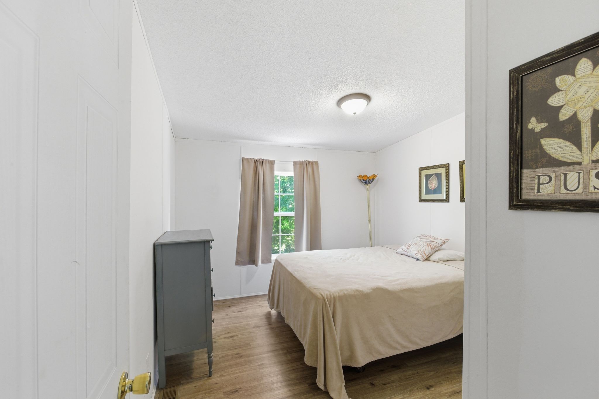 230 East Piney Road Dickson, TN 37055 - Photo 24 of 36 a bedroom with a bed and a large window