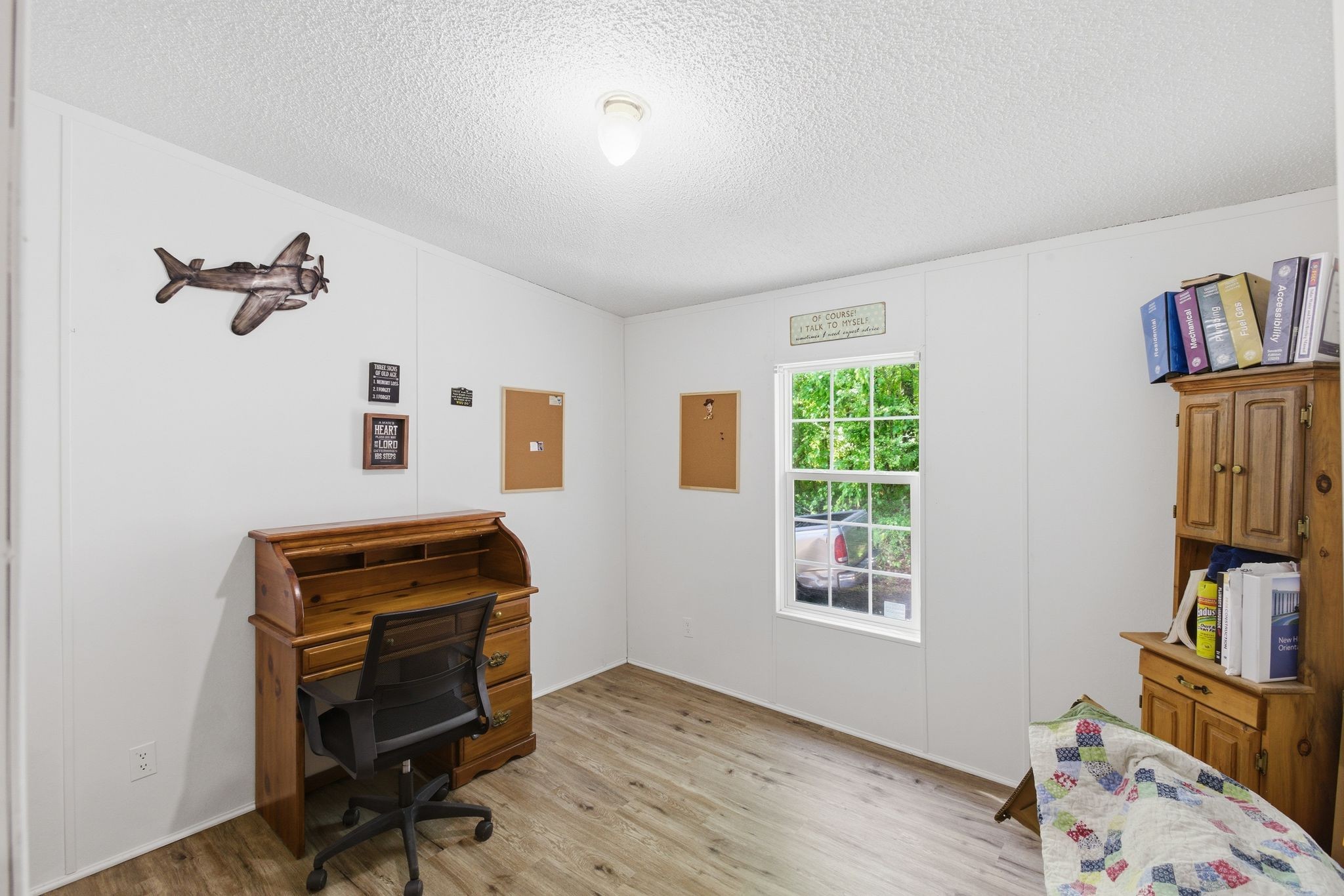 230 East Piney Road Dickson, TN 37055 - Photo 27 of 36 a view of a workspace with furniture and a bookshelf