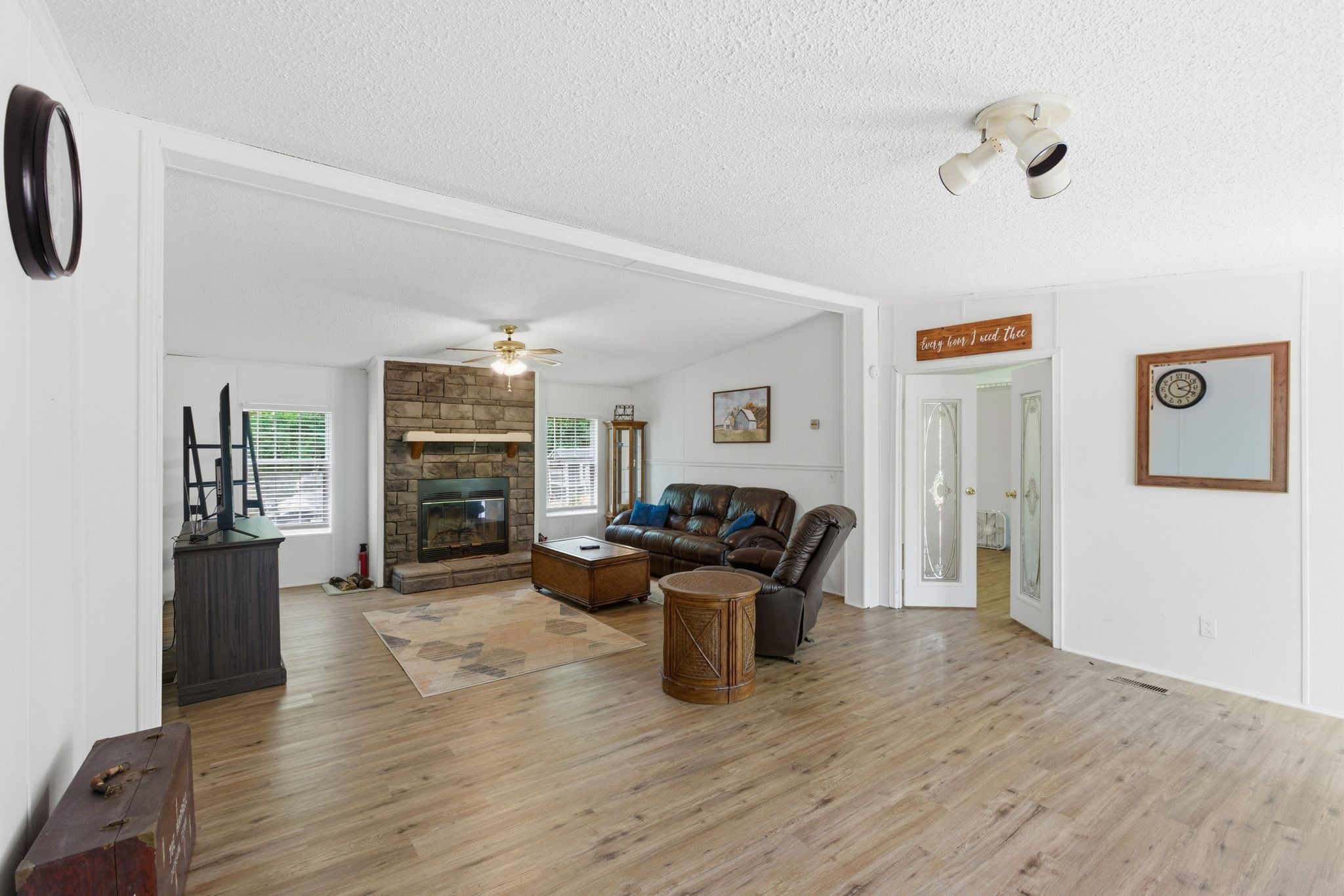 230 East Piney Road Dickson, TN 37055 - Photo 8 of 36 a living room with furniture wooden floor and a fireplace