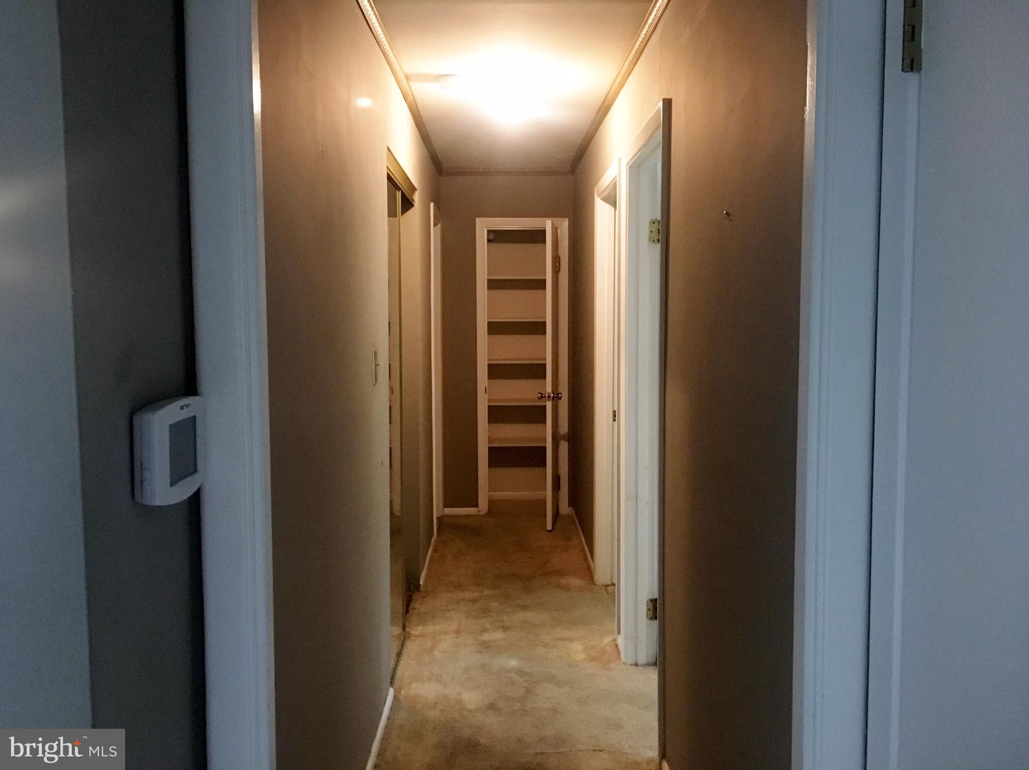 3714 Mayberry Avenue, Unit E Baltimore, MD 21206 - Photo 16 of 24 a view of hallway with stairs and a bathroom