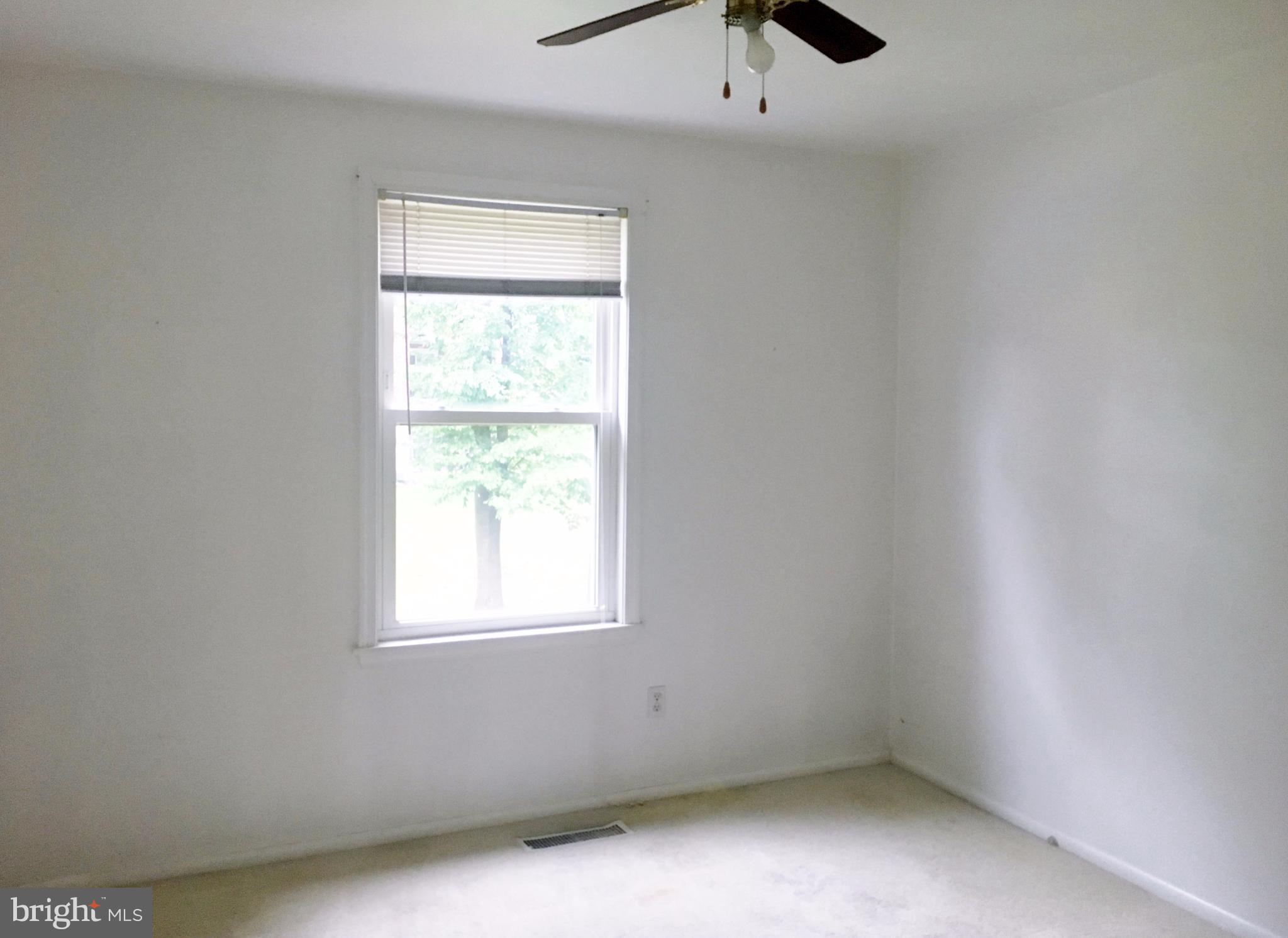 3714 Mayberry Avenue, Unit E Baltimore, MD 21206 - Photo 17 of 24 an empty room with a window